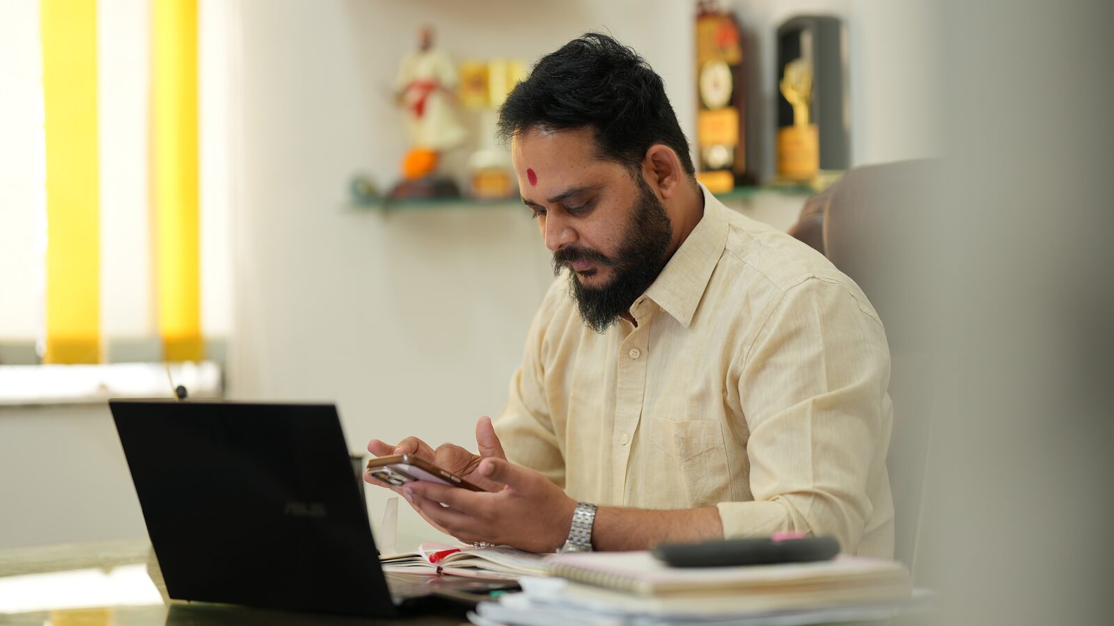 Parag Patil, founder of Shuray Amruttulya, working at his office desk