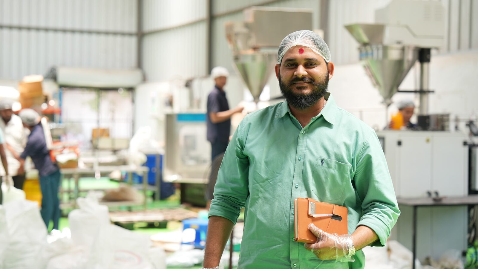 Parag Patil inside the Shuray Amruttulya manufacturing and packaging unit